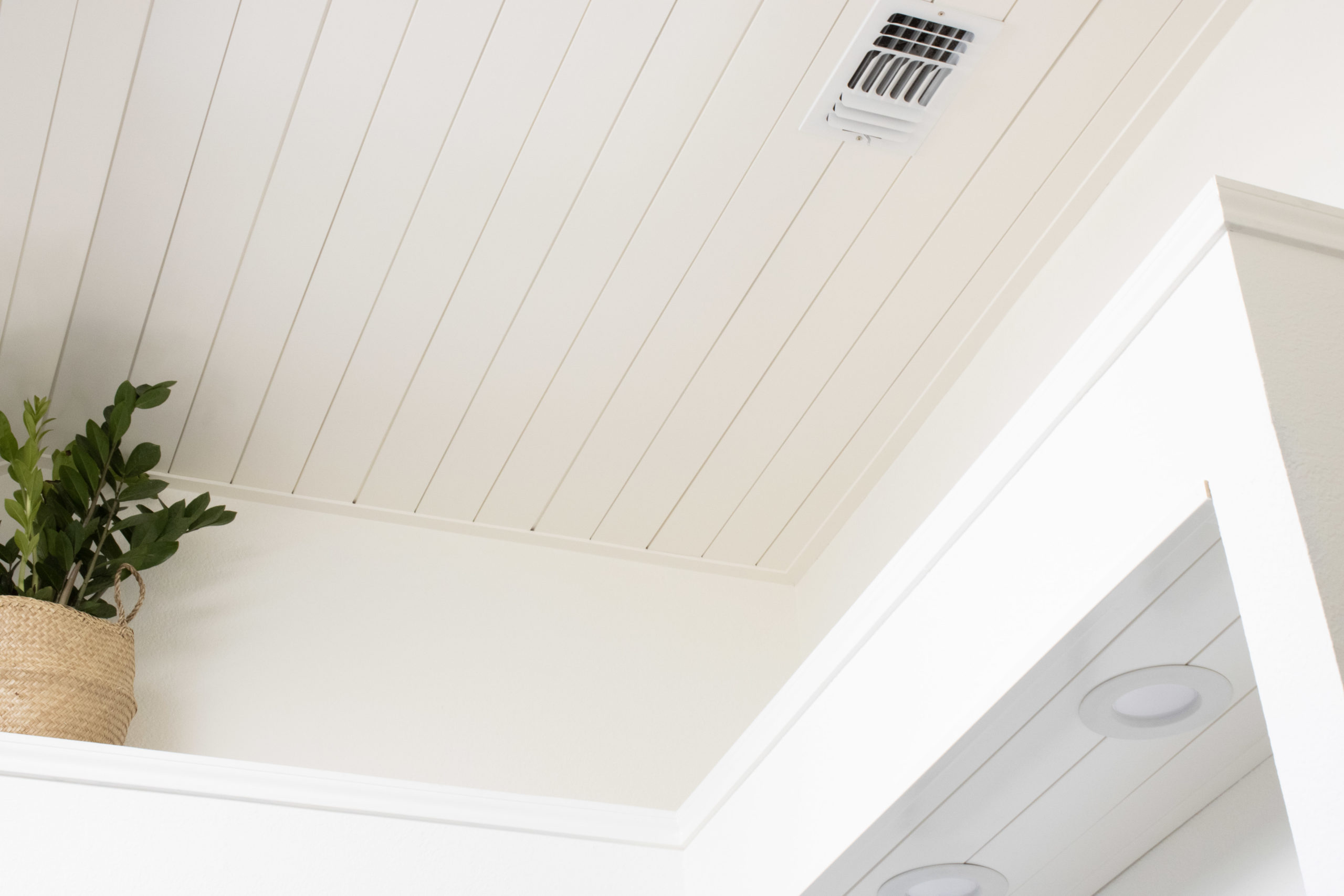 White Ceiling Shiplap Design with low-profile trim