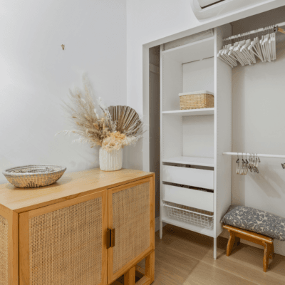 Bedroom with open closet and new shelving