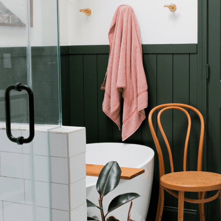 Primary bathroom renovation with Backwood Green shiplap and white walls