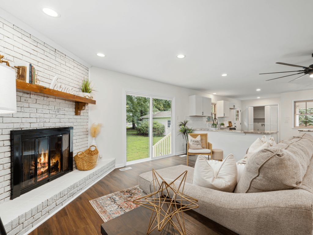White painted brick corner fireplace