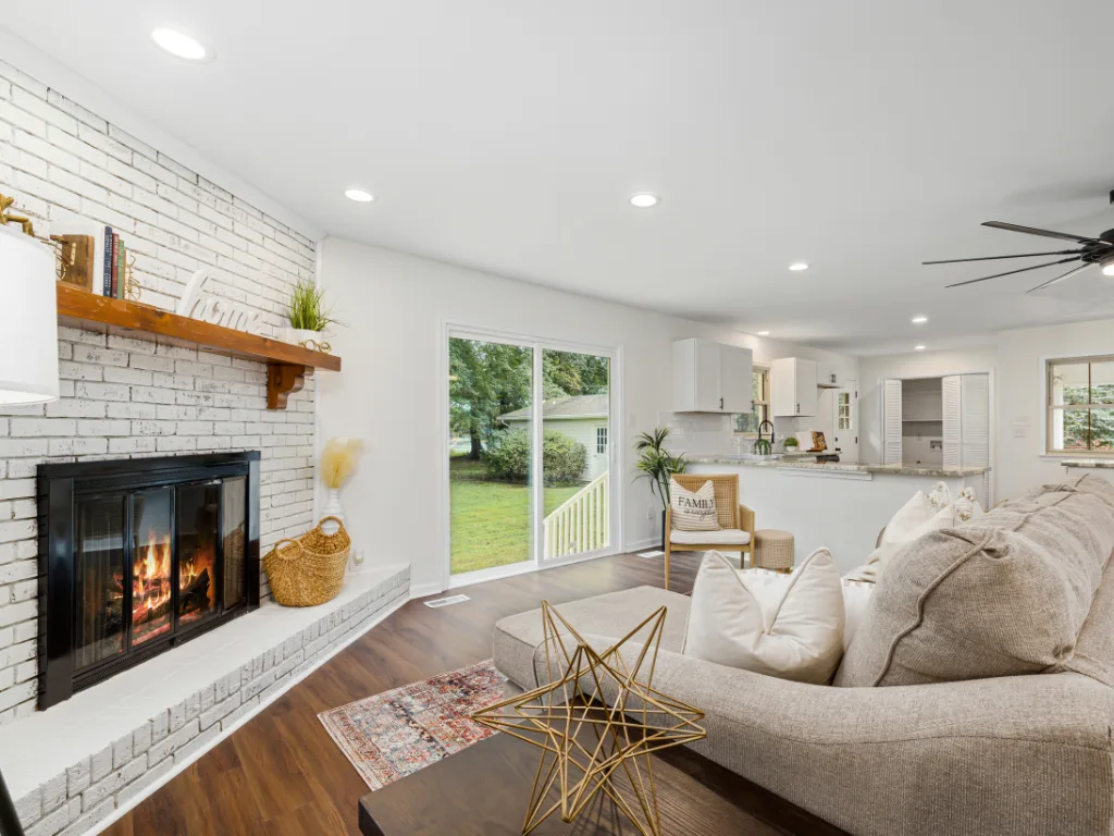 White painted brick corner fireplace